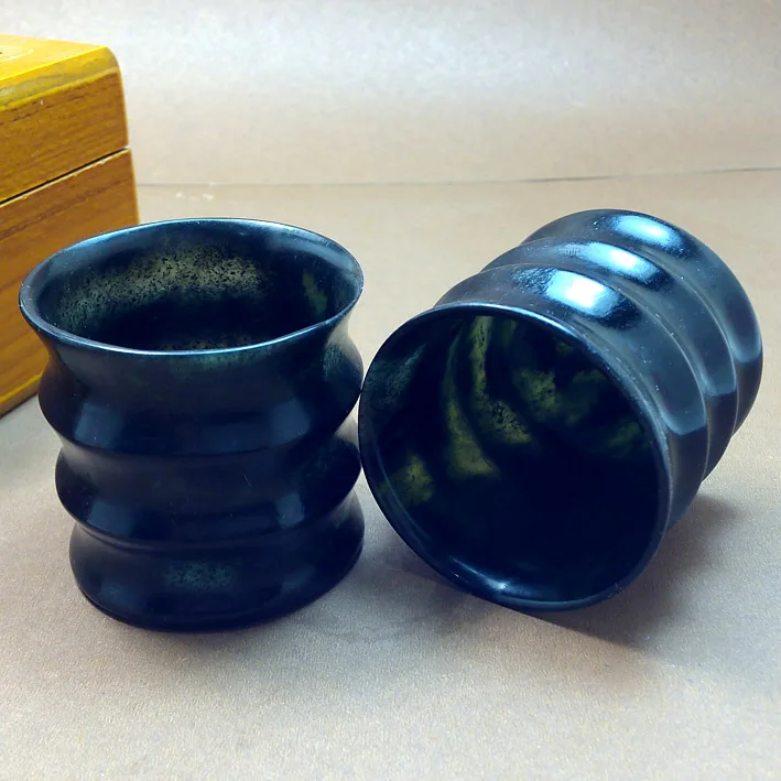 

Natural ink green jade slub shape teacup / wine glass.
