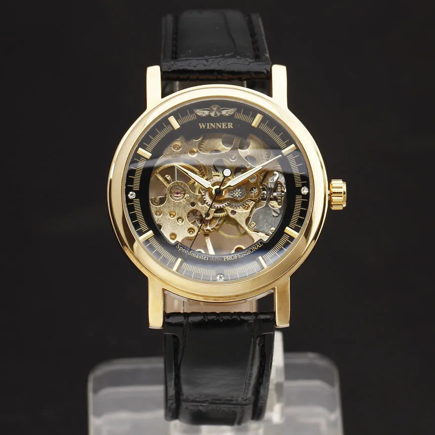 

Hot WINNER Brand Fashion Men Mechanical Hand-Wind Skeleton Dial Genuine Leather Strap Wrist Watch Classic Style Male Gift Clock
