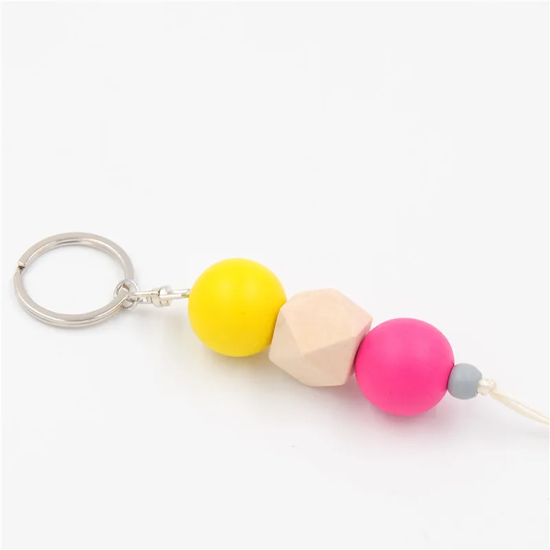 

Free shipping New Multicolor Geometric Wood Beads Keychain For Bag Round Wooden Beads Keyrings Gifts
