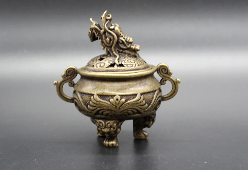

(mini) Exquisite Chinese Old-style Hollow-out Brass Dragon Head Censer