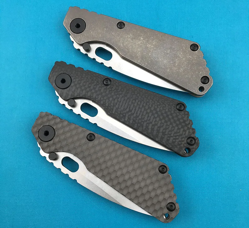 

LEMIFSHE SMG folding knife D2 blade titanium alloy loose diamond / pit / CF handle copper washing machine gift collection outdoo