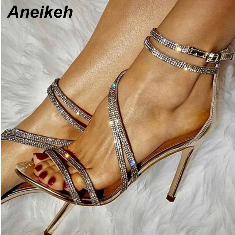 

Босоножки женские Aneikeh, с золотыми кристаллами, с открытым носком, стразы, ремешки, перекрестные, на высоком каблуке, свадебные модельные туф...