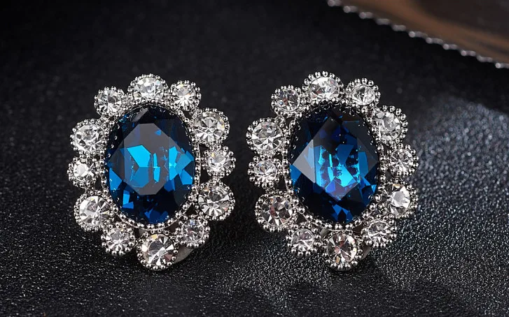 

COENINE New Fashion classic Luxury Simulated Blue Crystal Oval Stud Earrings for Women Piercing Jewelry