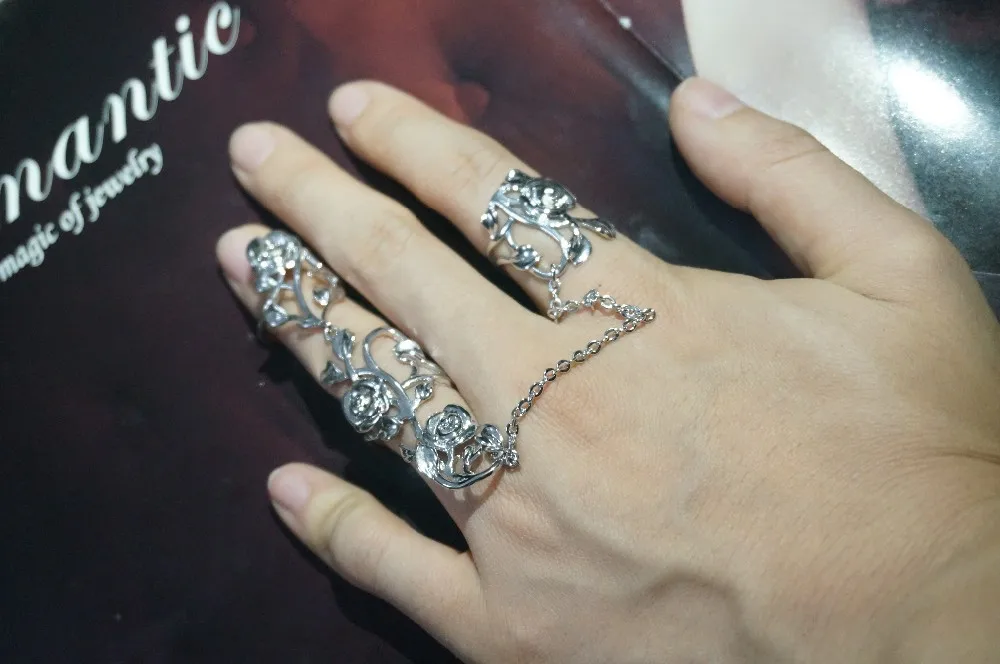 Кольцо на два пальца с цепочкой розовым пером золотым и серебряным покрытием |