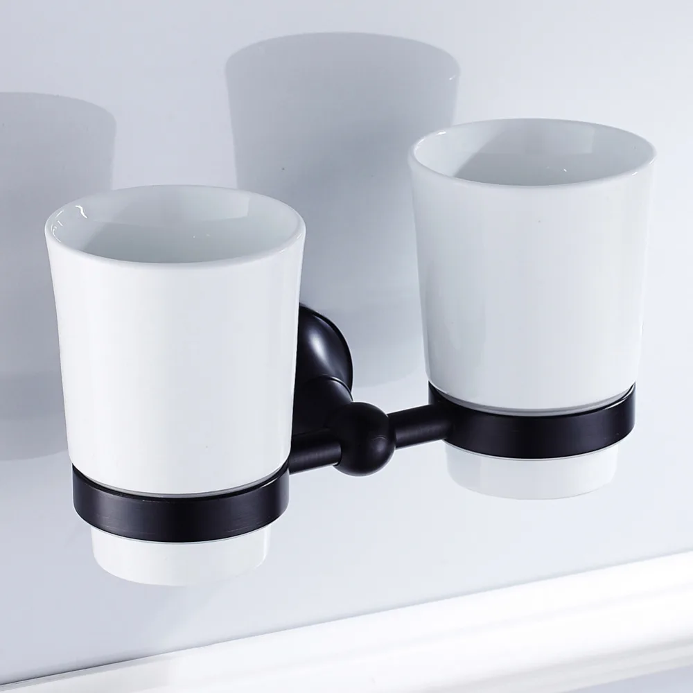 

Leyden Oil Rubbed Bronze Brass Black Toothbrush Holder With Double Ceramic Cups Holders Wall Mounted Bathroom Accessories Set