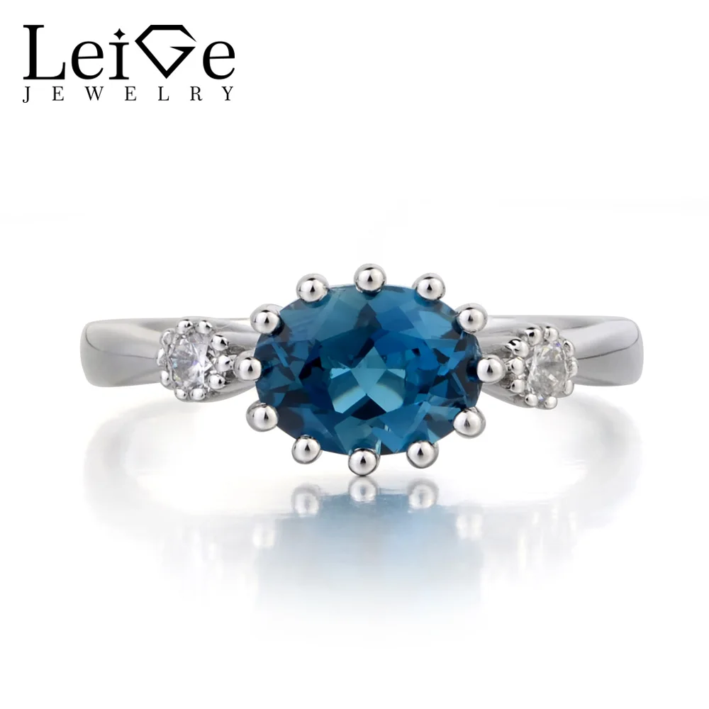 Женское Обручальное кольцо с голубым топазом | Кольца