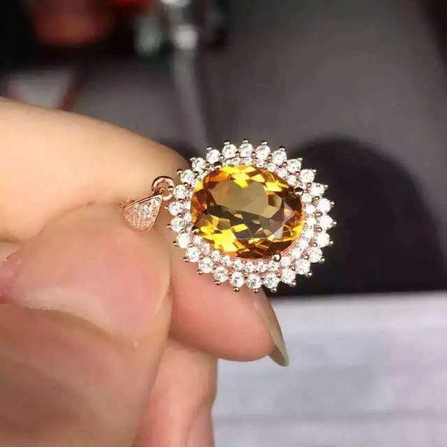 

Кулон из серебра 925 пробы с натуральным цитрином и желтым кристаллом