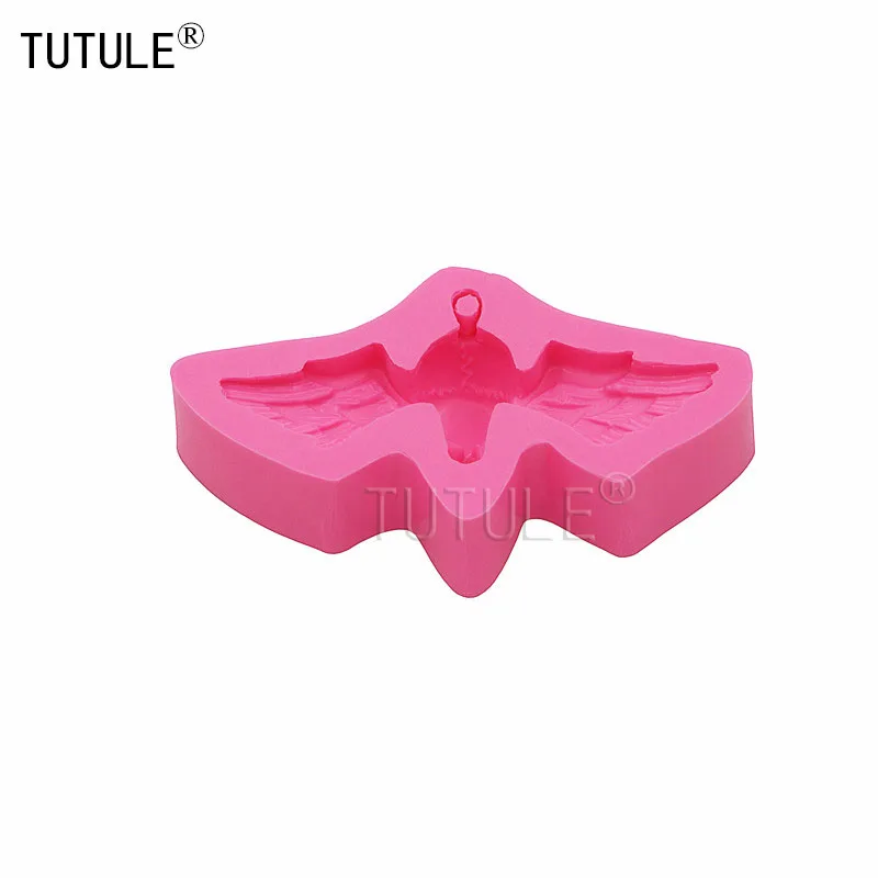 Силиконовая форма с ангельскими крыльями и черепами изготовленная из