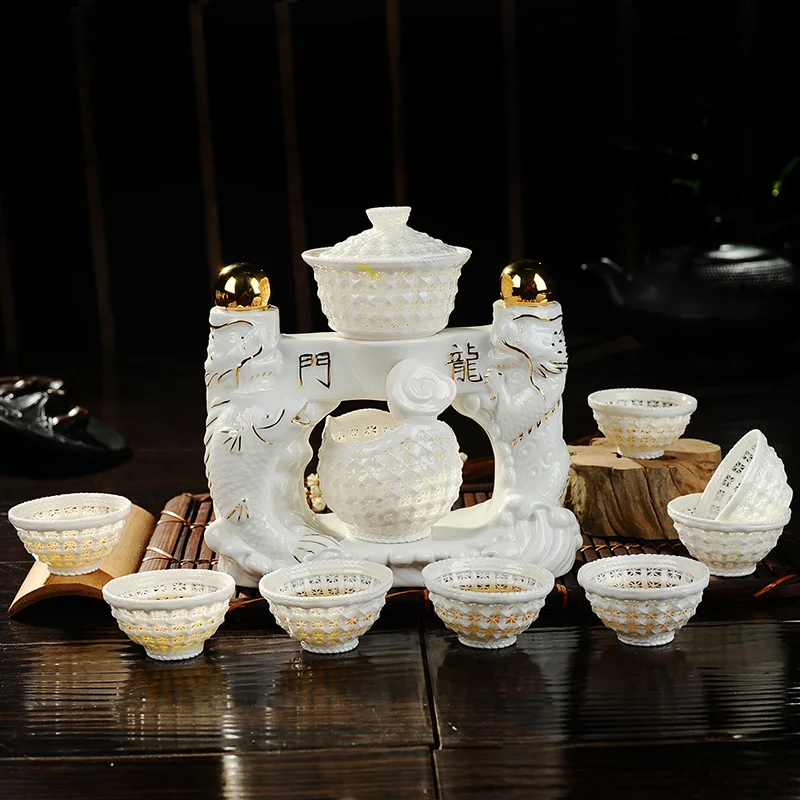 Pure hand woven exquisite tea set automatic crystal hollow ceramic bone China Kung Fu of high-end gift box | Обустройство дома