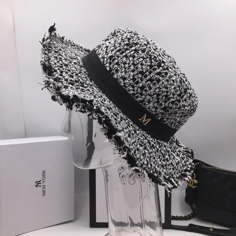 Fashion flat-topped hat black and white knitting small letters fashion tassel wide brim British vantrend men women |