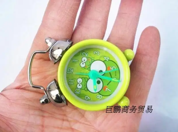 Lovely small quartz clock 202 Mini cartoon alarm button batteries get up lazy students watch table |