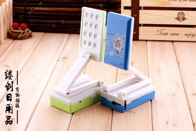 

Creative multi-section folding table lamp led rechargeable lamp to protect the lamp reading lamp