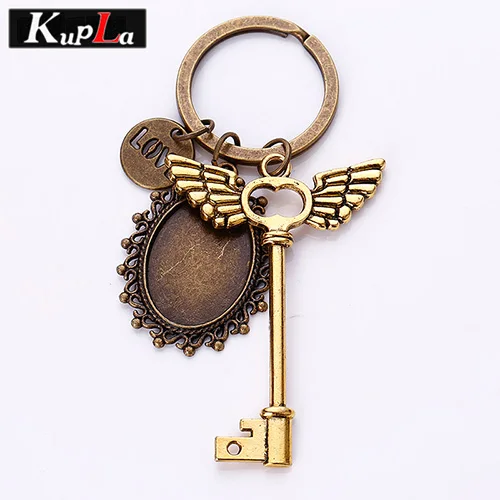 Antique Bronze 3 Винтаж брелки 18*25 мм Овальный Кабошон Установка Модные Крылья ключ подвеска брелок DIY ручной работы ретро брелки 4 шт./лот C5816 - Цвет: Antique Bronze 3