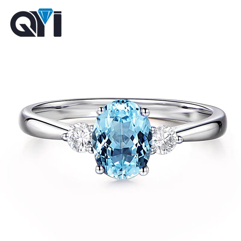 

QYI Trendy Blue Topaz Three Stone Ring 925 Sterling Silver Women Wedding Party Jewelry Oval Cut Gemstone Engagement Rings
