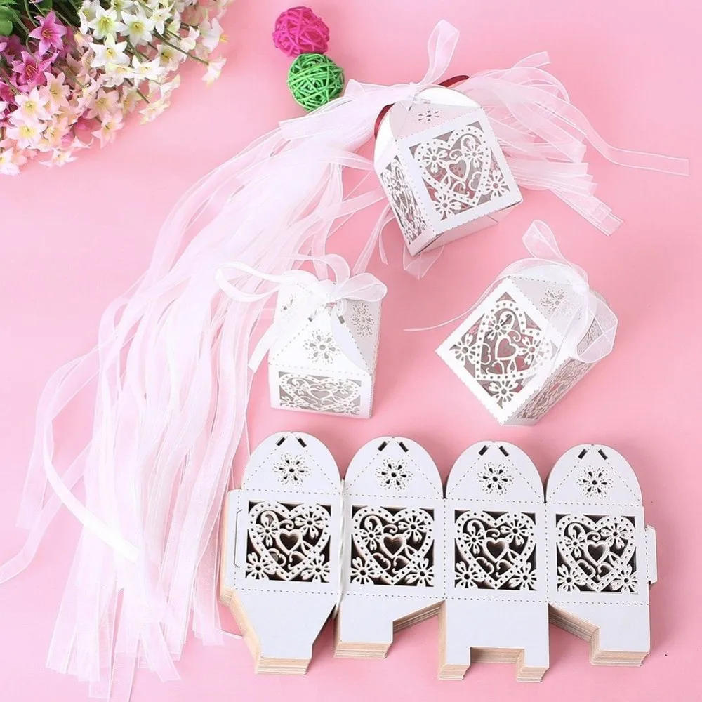 

Free Shipping wedding candy box Love Heart Laser Cut Candy Gift Boxes With Ribbon Party sweet Favor Creative Bags 400pcs/lot