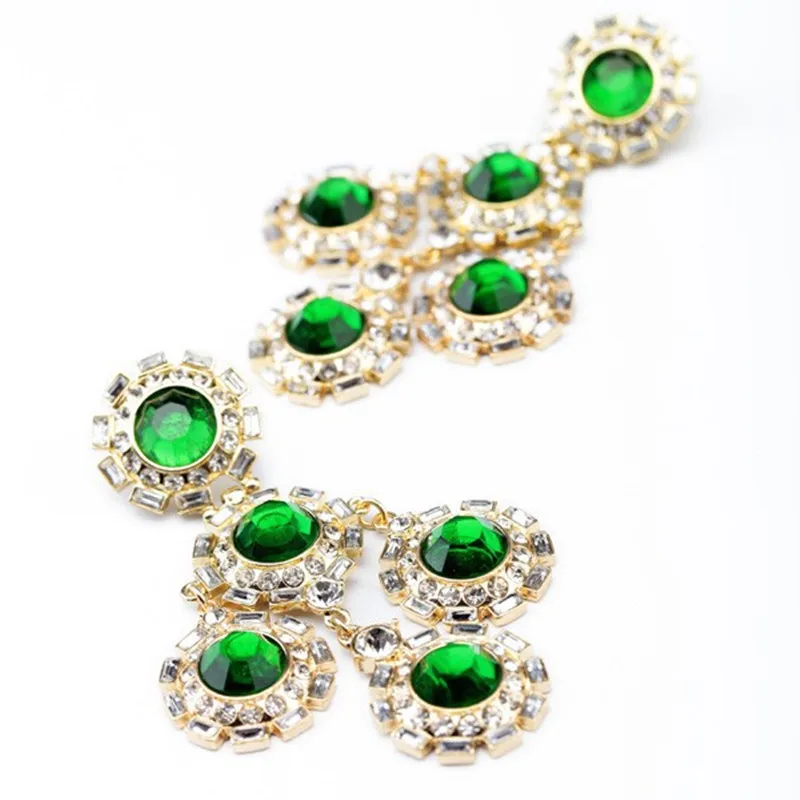 Женские крупные серьги с кристаллами wing реалистичные золотого цвета зеленым