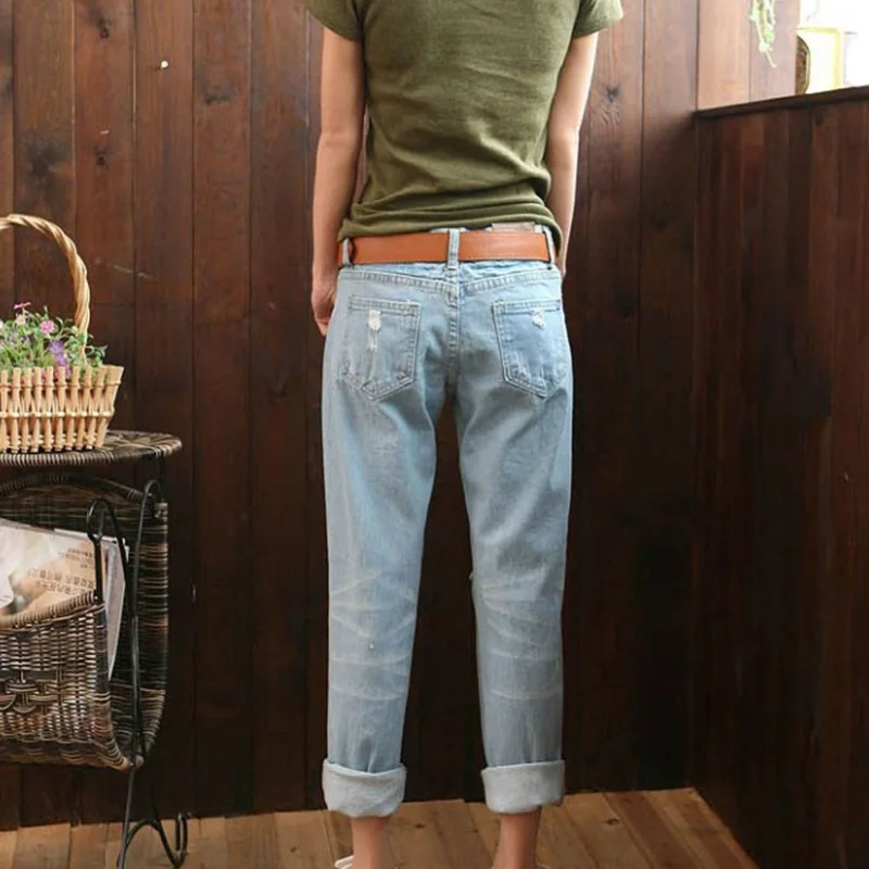 

2019 summer new Korean version of the hole jeans female high waist nine points harem pants wild loose pants