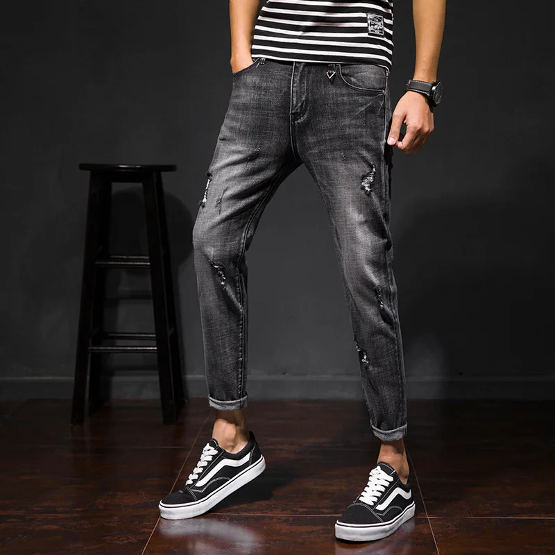 

Men's casual pants jeans new spring 2020 feet cultivate one's morality street hole elastic nine minutes of pants