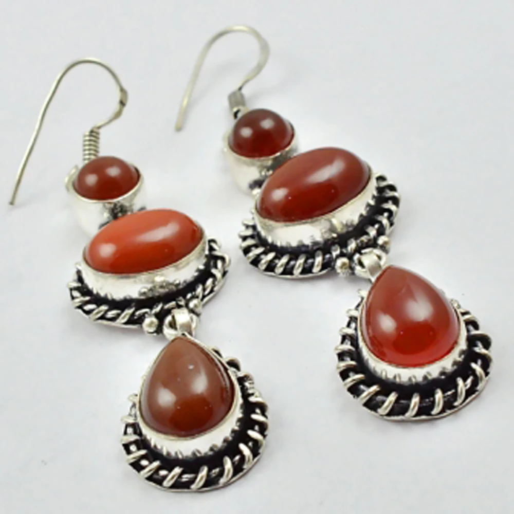 

Сердолик, серебряное покрытие на медных сережках, 65 мм, E2661