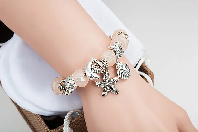 Браслет женский с розовыми бусинами и морскими звездами черепашками