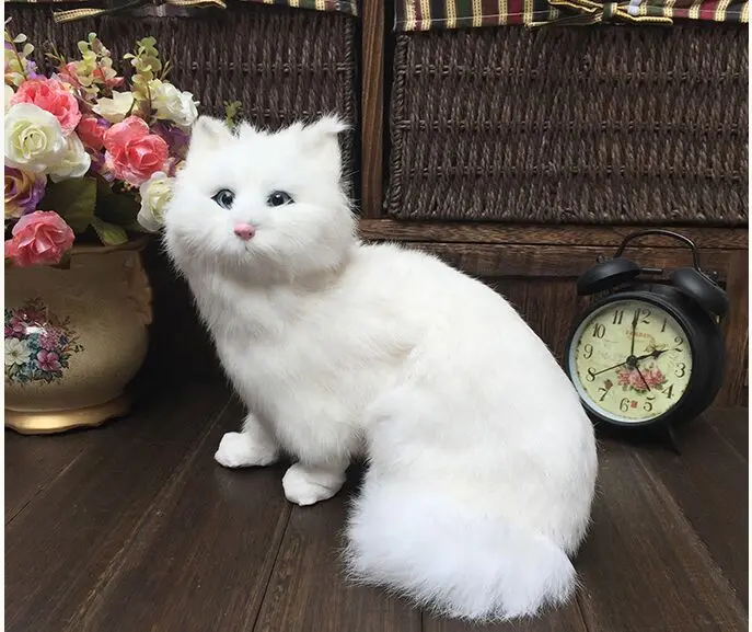 Большая игрушка в виде сидящего кота из полиэтилена и пуха кукла белого 24x22 5 см