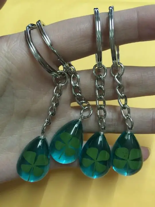 

25 pcs keychain real four leaf clover jewelry blue drop jewelry