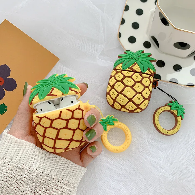 Чехол для AirPods со забавной карикатурой ананаса, защищающий их силиконовым покрытием и имеющий кольцо для пальца.