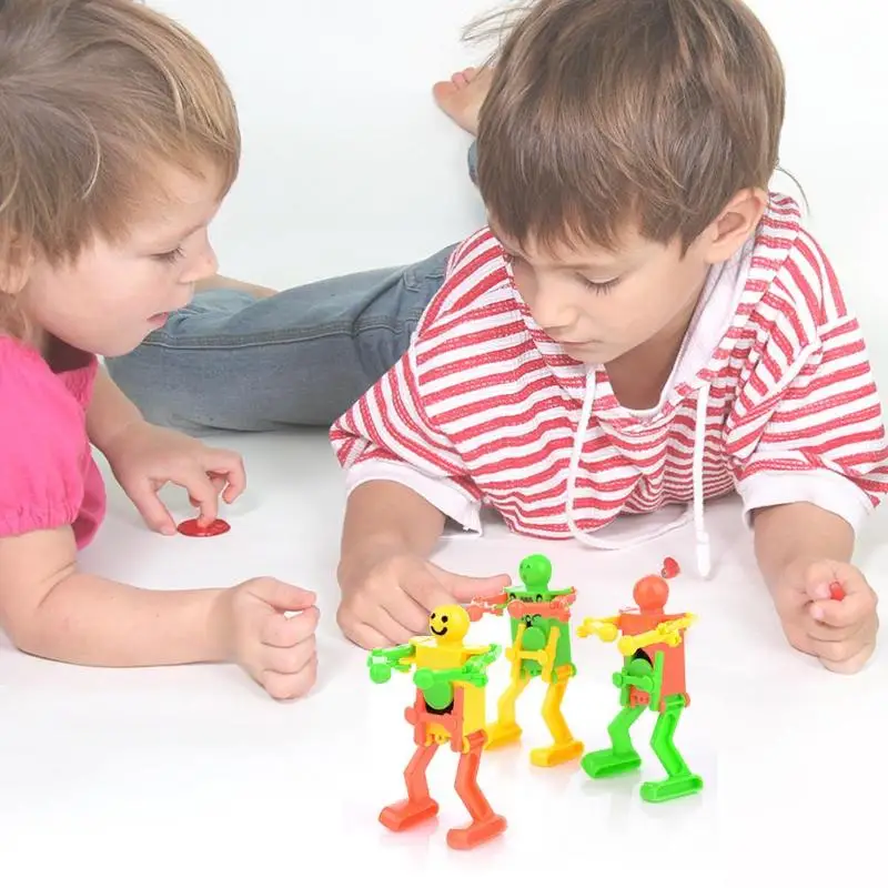Hot Selling New Classic Funny Wind Up Toys Children Kids Plastic Clockwork Spring Dancing Robot Toy Gifts Random Color