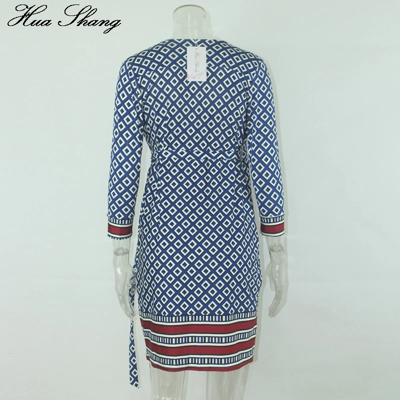 Женское платье средней длины с запахом v-образным вырезом и рукавом три четверти