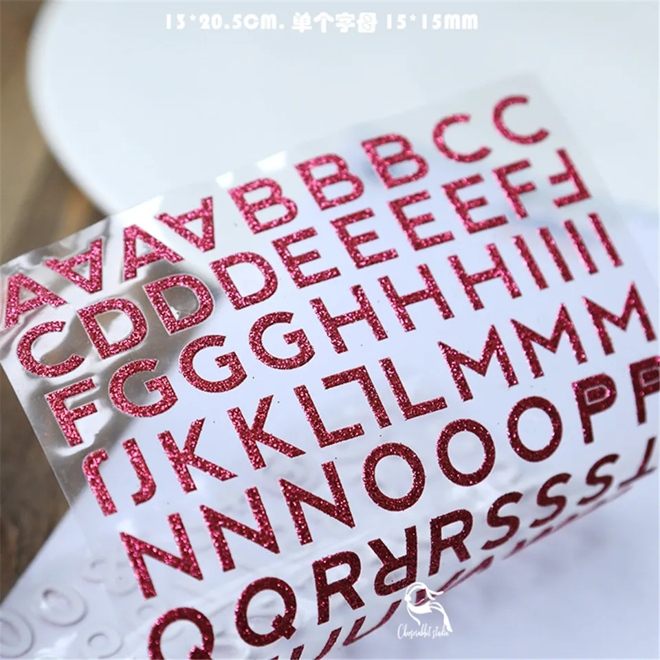 Набор золотистых и серебристых бумажных наклеек в виде порошка высечка для