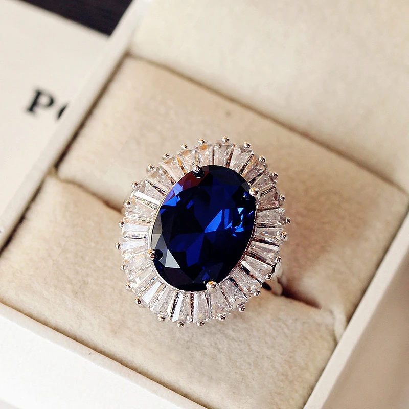 

Luxury Gorgeous eye-catching Oval Big Royal Blue Stone Ring Trapezoid crystals column Surround Women wedding Jewelry Gift