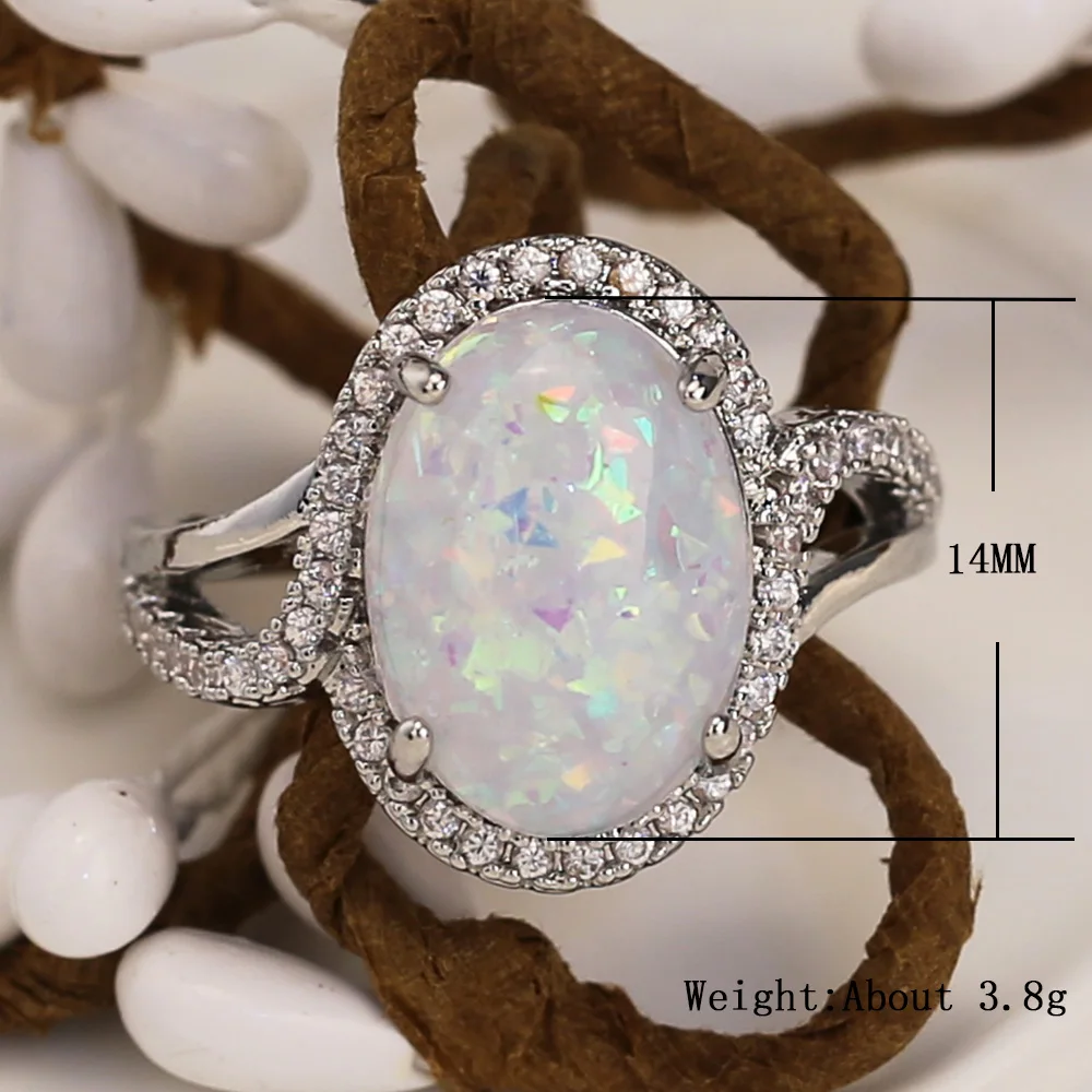 

Huitan Luxury Solitaire Ring with Huge Created Fire Opal Prong Setting Halo CZ Pave Fashion Cocktail Party Rings for Women