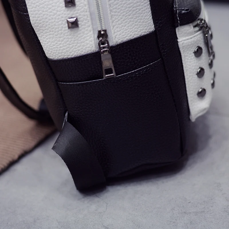 Новинка 2017 г. дизайнерские черные белая кожа заклепки рюкзак школьные сумки для