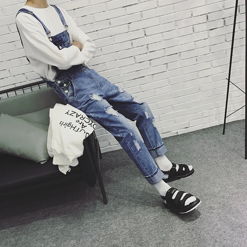 

2019 New Korean version of the Men's Plus Size Overalls Fashion Hole Denim Pants Retro Couple Jumpsuit Suspenders Pants