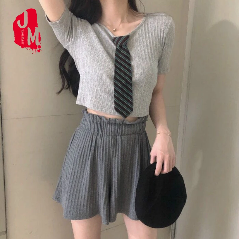 Сексуальный короткий комплект из двух предметов укороченный топ и эластичные