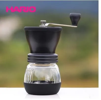 Слоновая кость Японская ручная кофемолка HARIO, керамическая основная бытовая ручная портативная кофемолка, моющаяся - Цвет: Слоновая кость