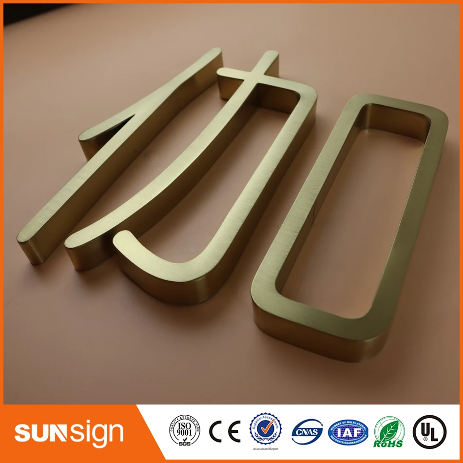 outdoor rose gold stainless steel letter sign board