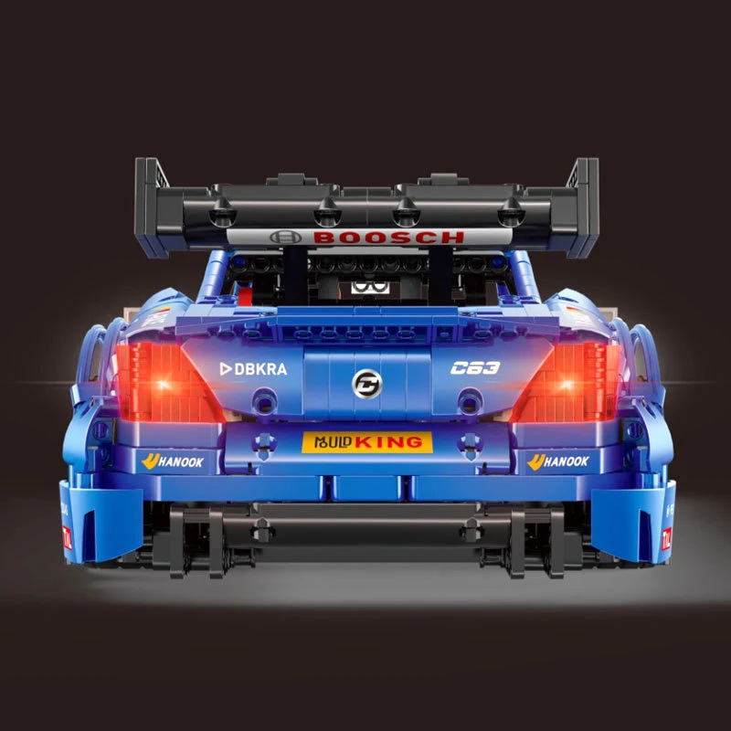 Yuxing assembled building blocks electric remote control blue sports car children enlightenment free DIY spell plug toy