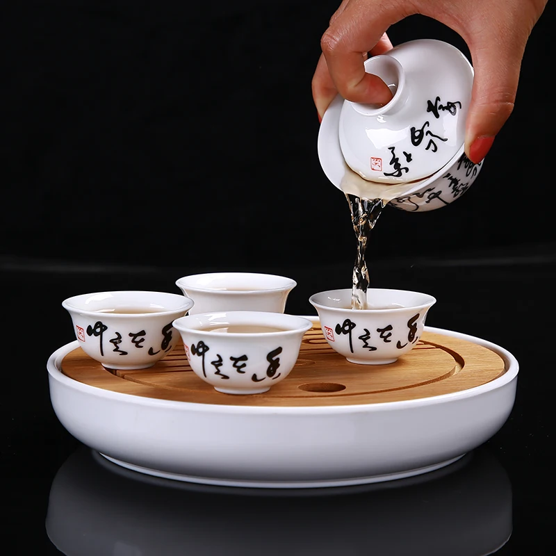 

Дорожный чайный набор, портативные китайские чайные чашки кунг-фу [1 Tureen + 6 чашек] с бамбуковым чайным подносом, керамический чайный столик д...