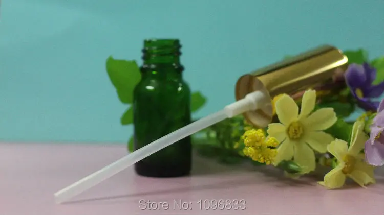 Зеленая стеклянная бутылка 10 мл с золотым колпачком и черным для косметического