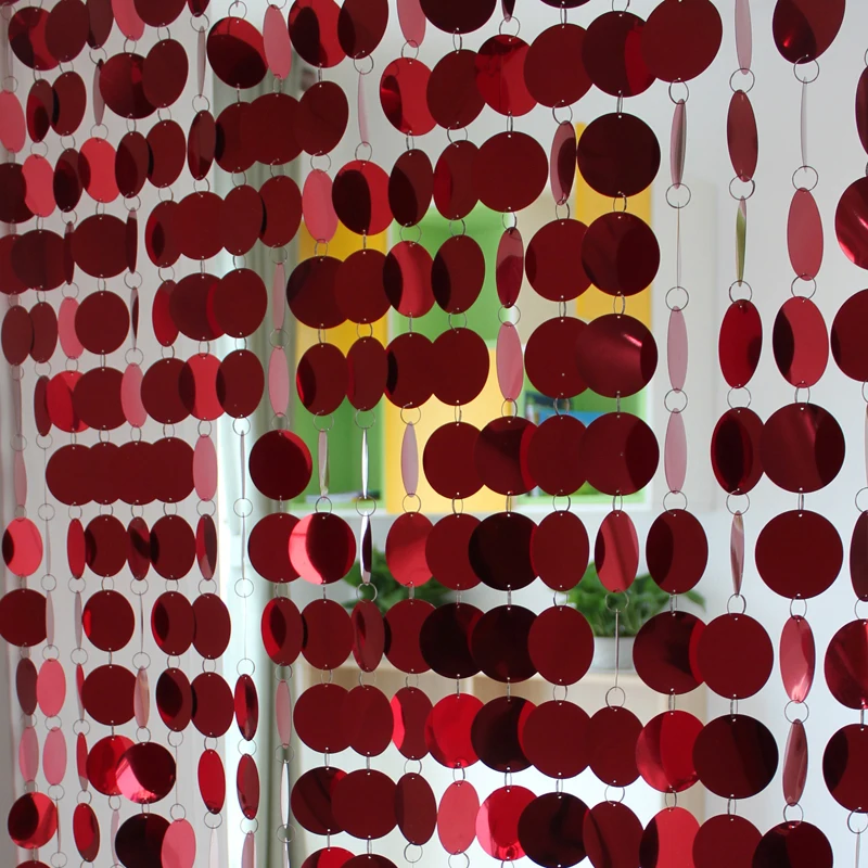 

Festive red wedding background with decorative curtains Christmas tree decoration sequins decoration accessories