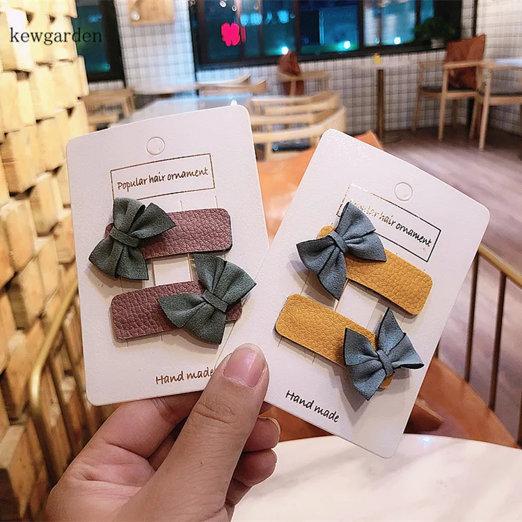 

Kewgarden Baby Girls Hair Accessories Barrettes Contrast Color PU Bowknot Hairclips Headwear Side Clips 2 Pair / Lot