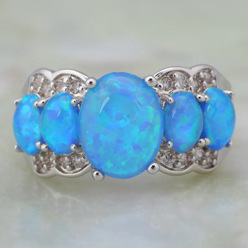 

Fashion White CZ Opal Rings Fine Jewelry Women's Rings Blue Fire Opal Silver Color Filled Gift Party Ring Size 5 6 7 8 9 R121
