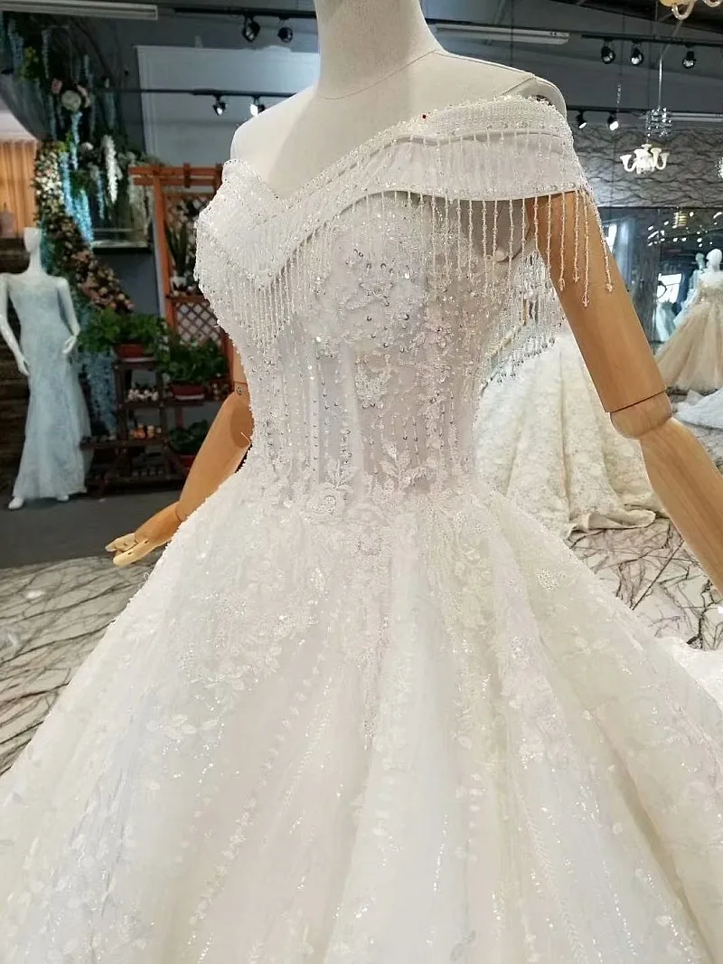 Бальные платья из блестящей ткани свадебные 2018 кружевные камни с открытыми