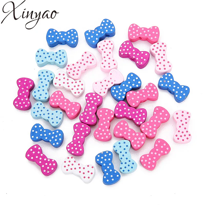 

XINYAO 50pcs 21X11mm Natural Wooden Beads Colorful Bow Tie Beads Spacer Wood Beads For Diy Jewelry Making Houten Kralen F7554