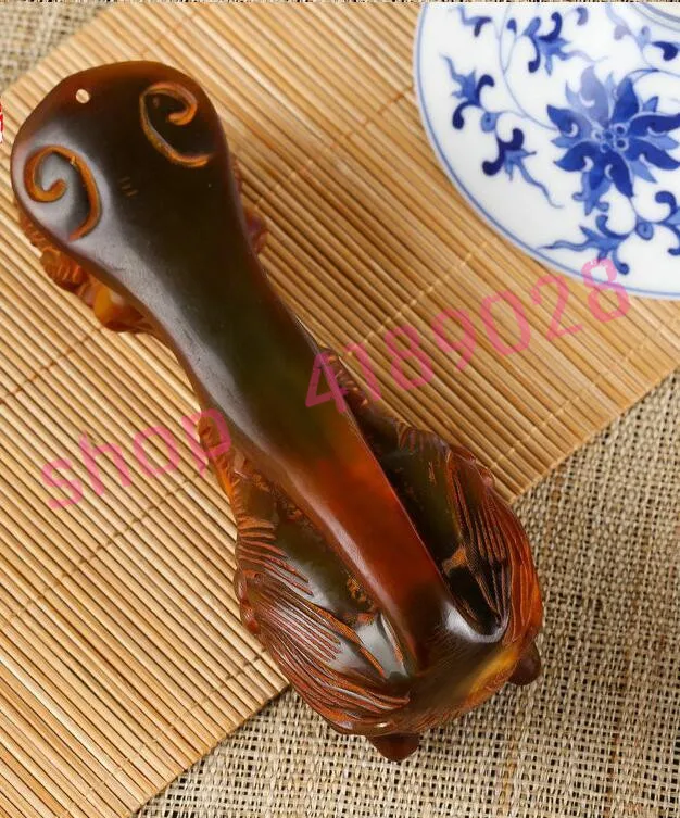 

Natural ox horn, hand carved dragon pearl handle, natural material handicraft.