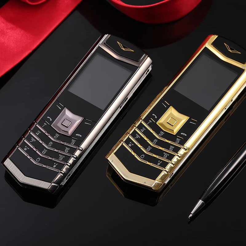 Роскошный мобильный телефон с русской панелью GSM bluetooth mp3 mp4 FM радио металлический