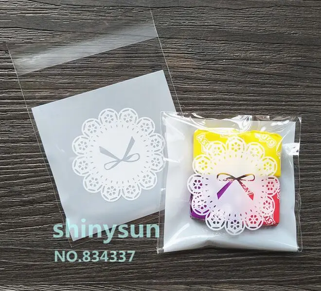 

100pcs/lot White Lace bowknot Cookie packaging bags 7x7cm small gift bag self adhesive plastic bags