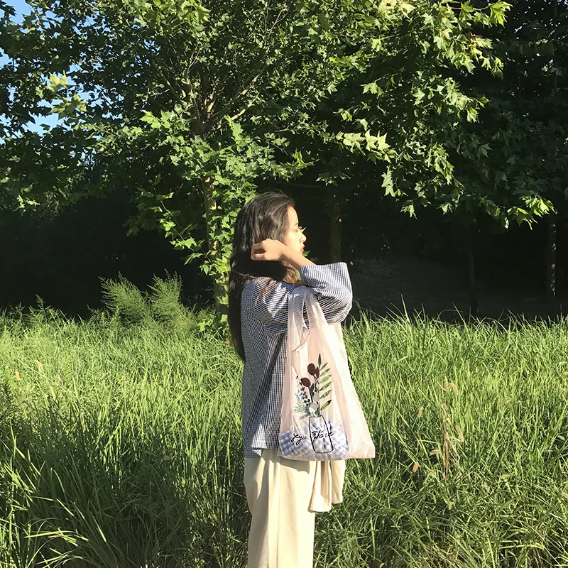 Тонкая и легкая прозрачная сетчатая сумочка с вышивкой женская сумка