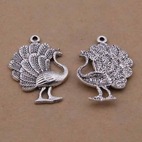 50pcslot vintage design zinc alloy metal peacock charms tone animal pendant 2435mm diy accessories